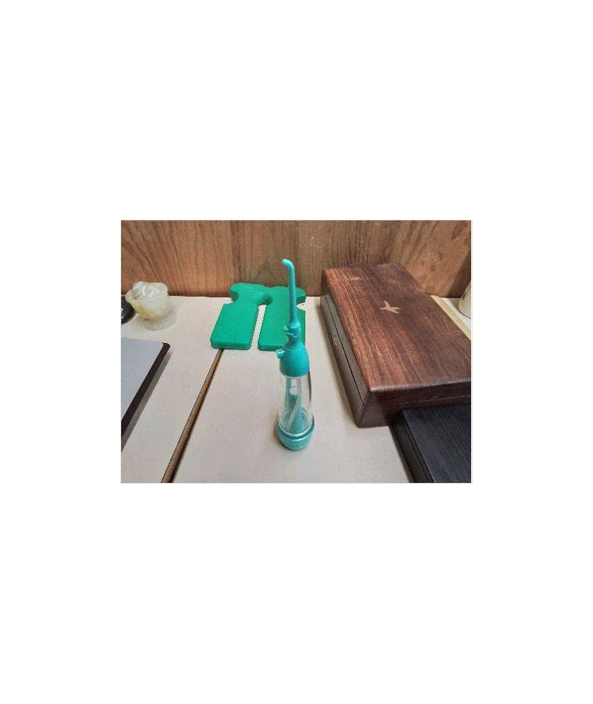 IRRIGATEUR BUCCAL PORTABLE 