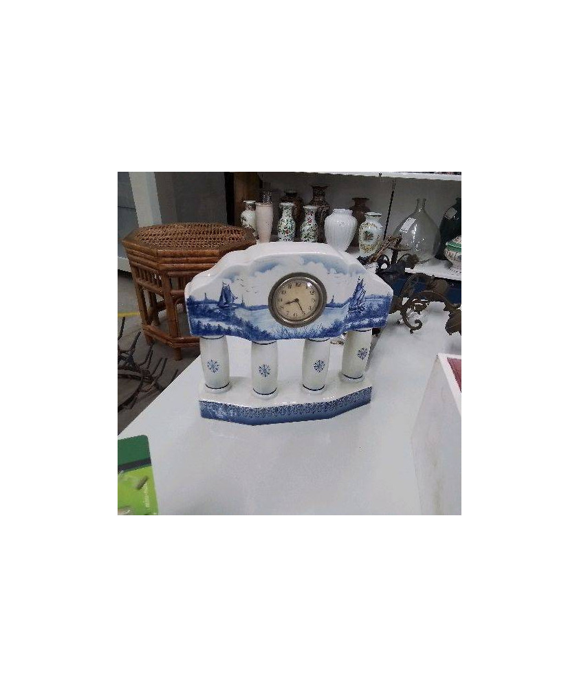 PENDULE EN FAIENCE 