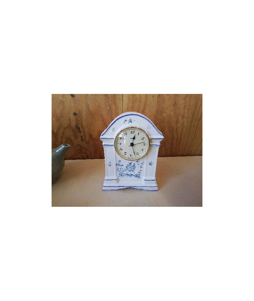PETITE HORLOGE EN FAÏENCE MOUSTIER 